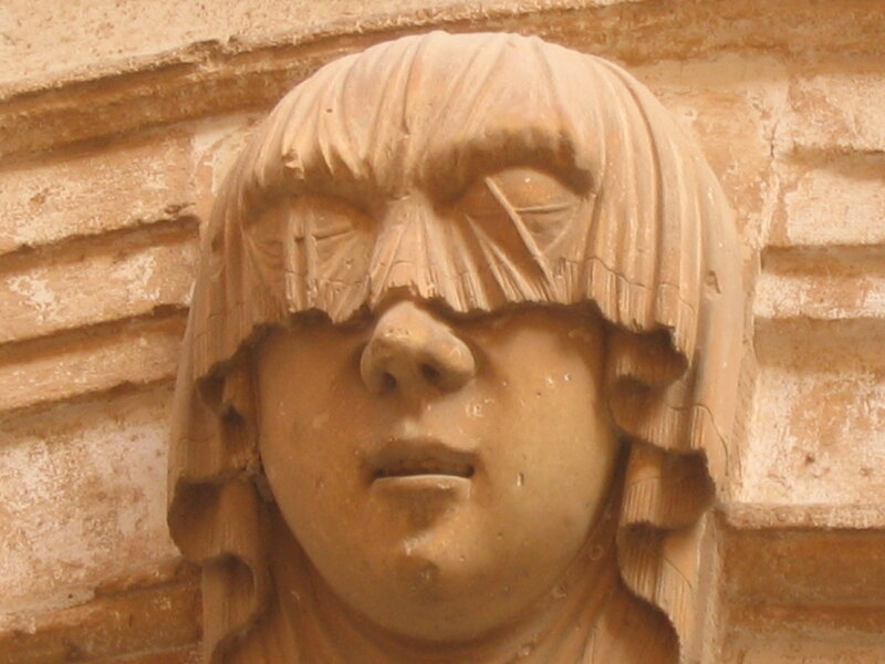 stone sculpture of a face