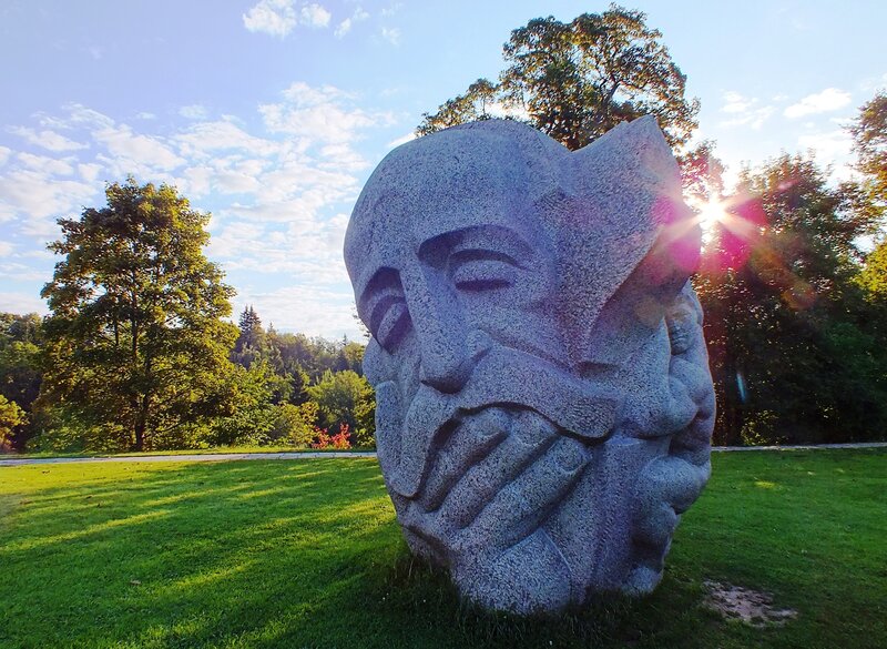 Stone Sculpture of a Face — Green