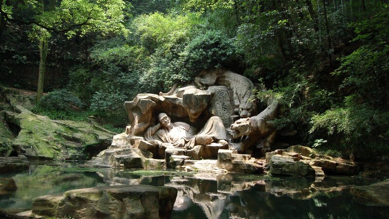 Stone Sculpture of Man and Tiger