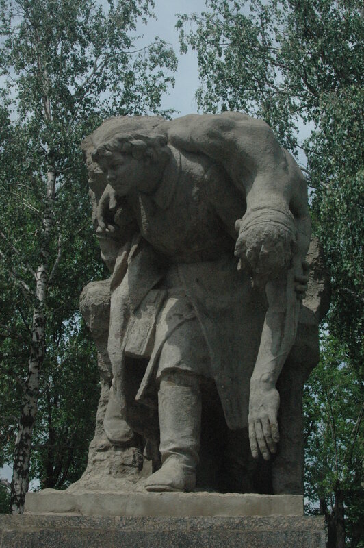 Stone sculpture of two figures