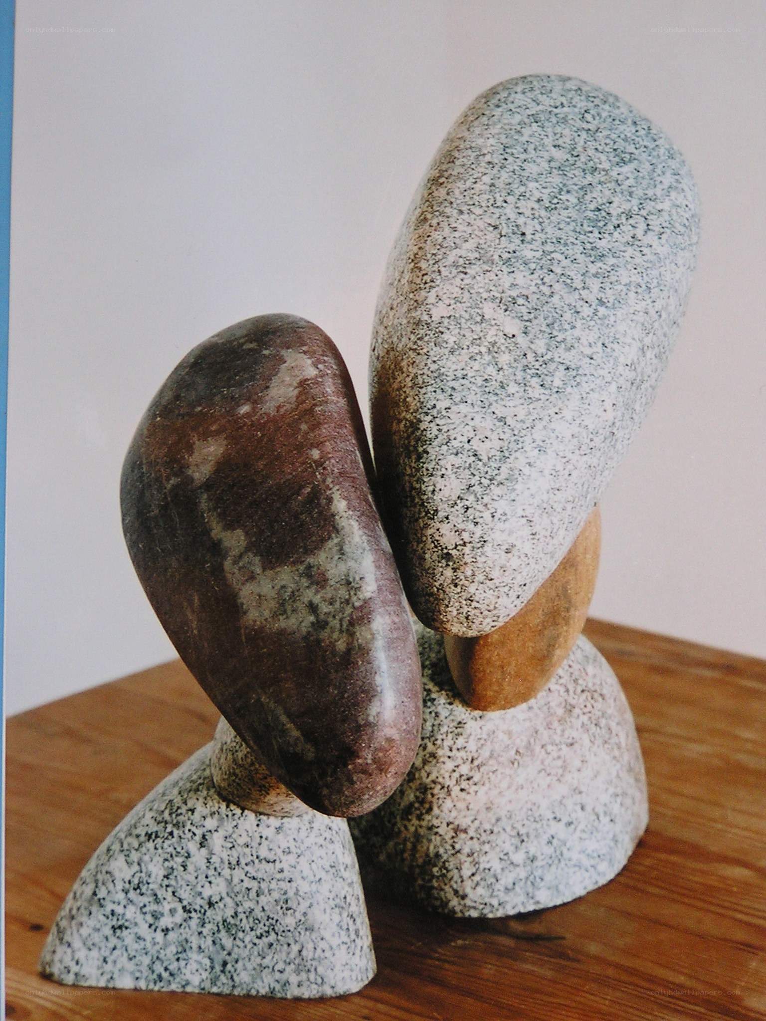 stone sculpture on wood