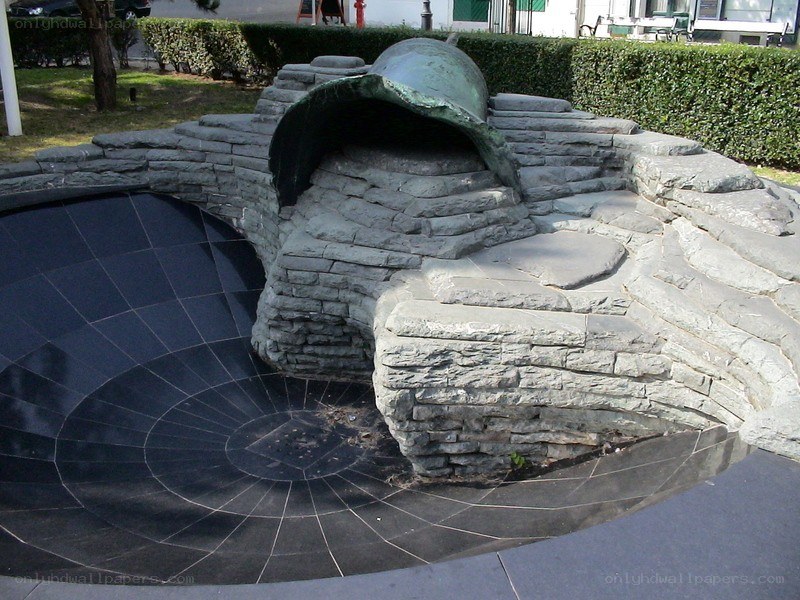 stone sculpture with bronze dome