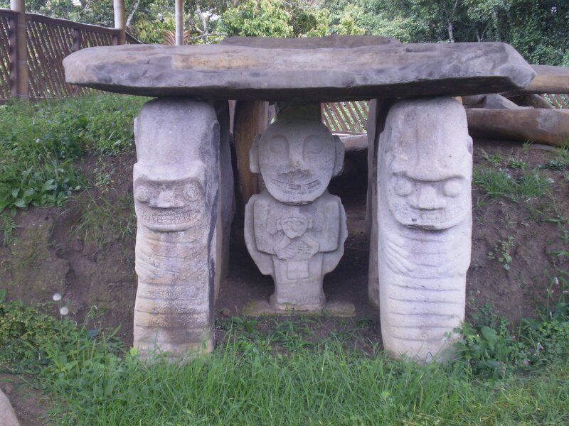 Stone sculpture with carved figures