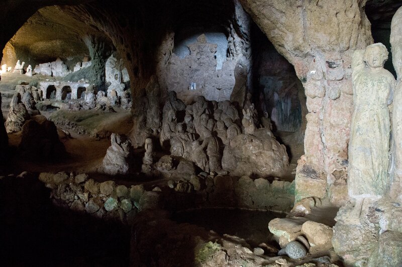 Stone Sculptures in Cave — Brown