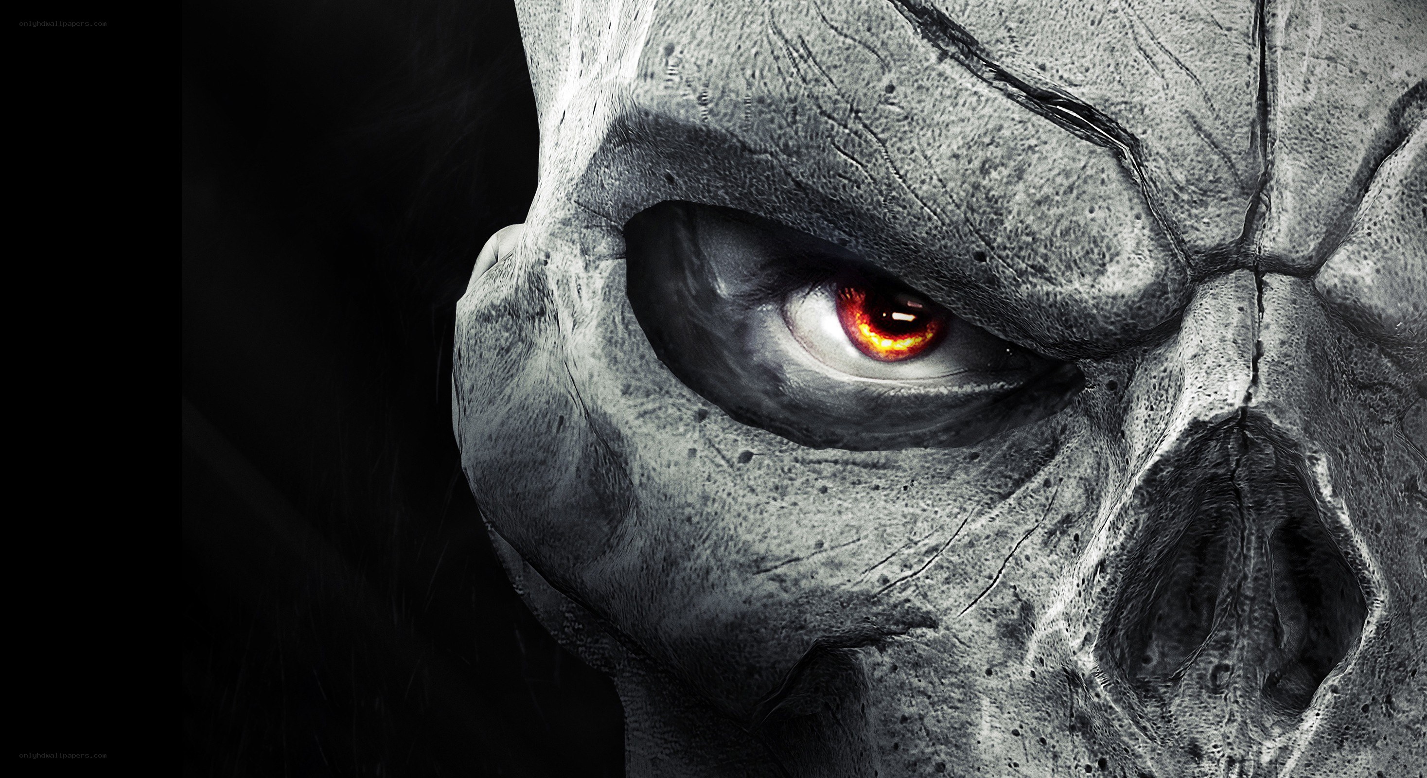 stone skull with glowing eye