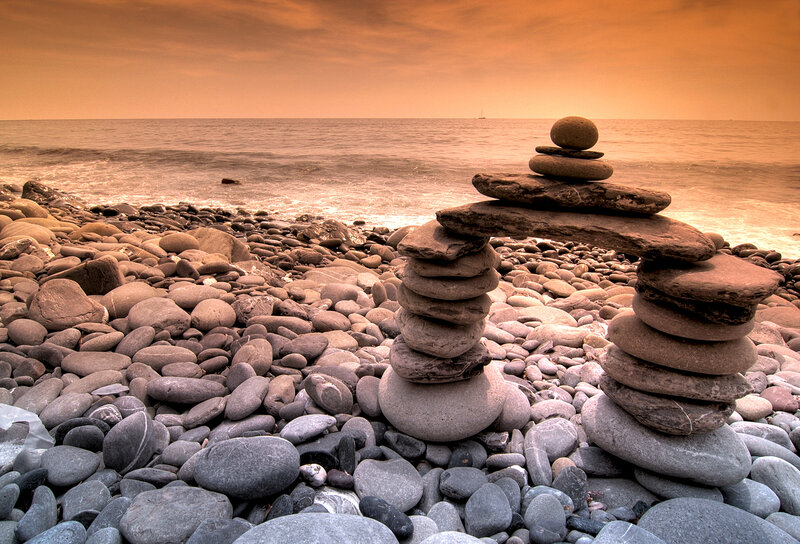 Stone stacks on a pebble beach