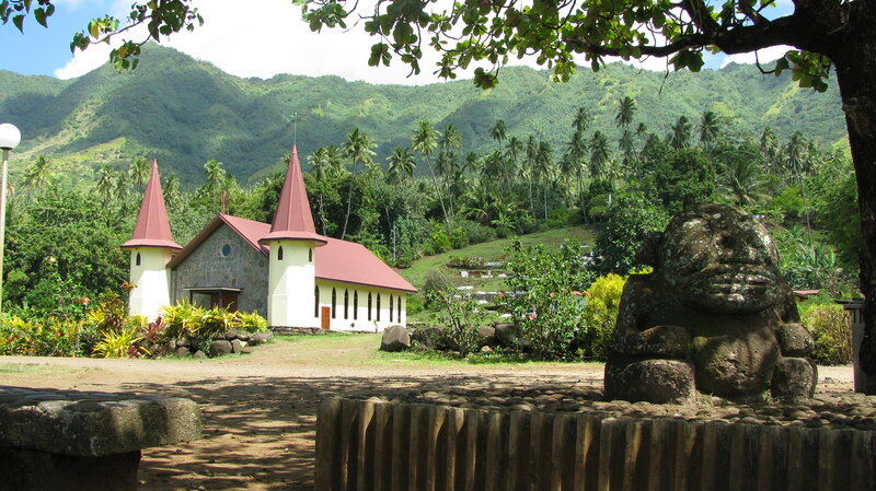 Stone Statue and Church