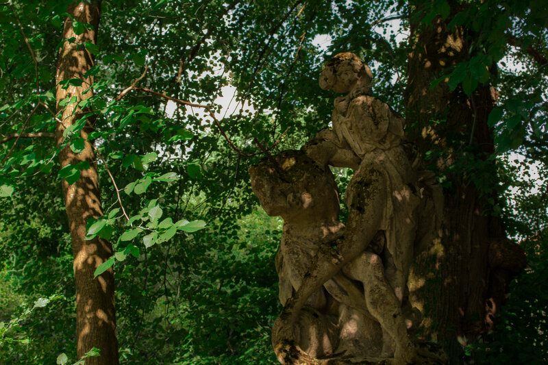 Stone Statue in Forest — Green