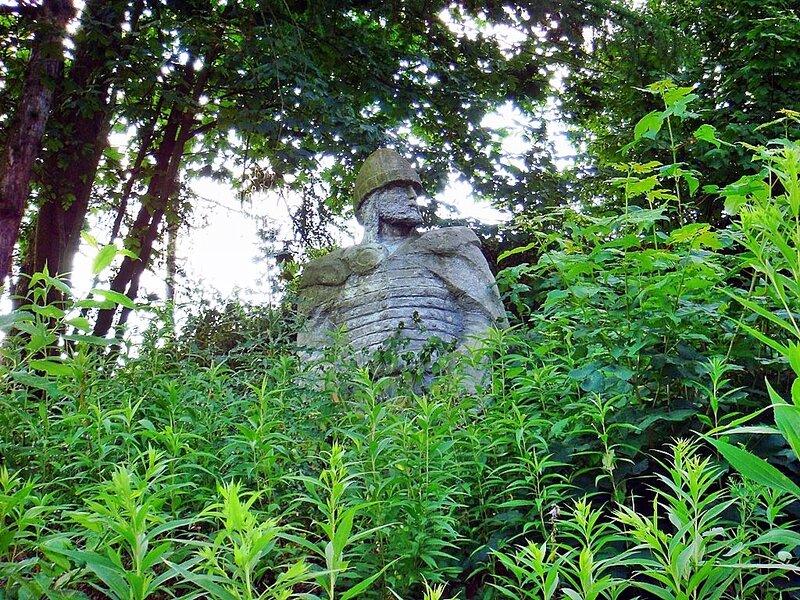 Stone Statue in Forest