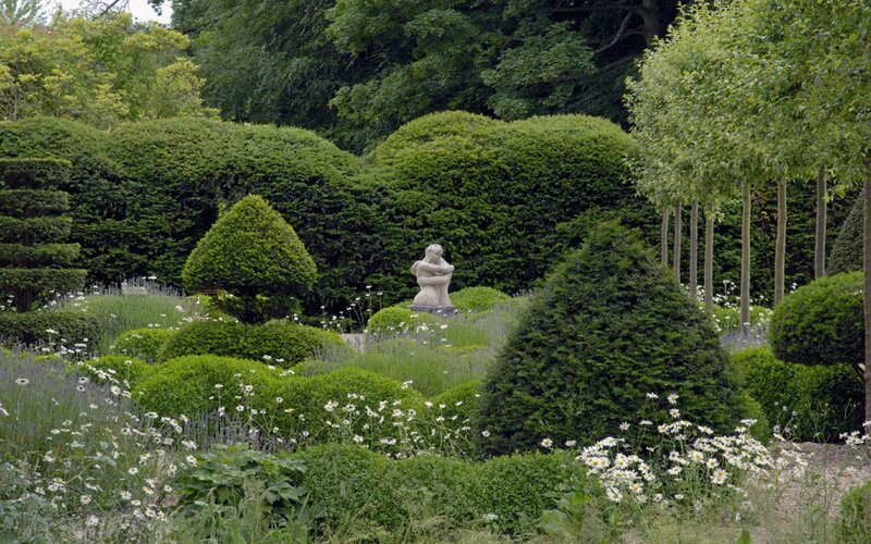 Stone Statue in Garden — Green, Serene, Afternoon