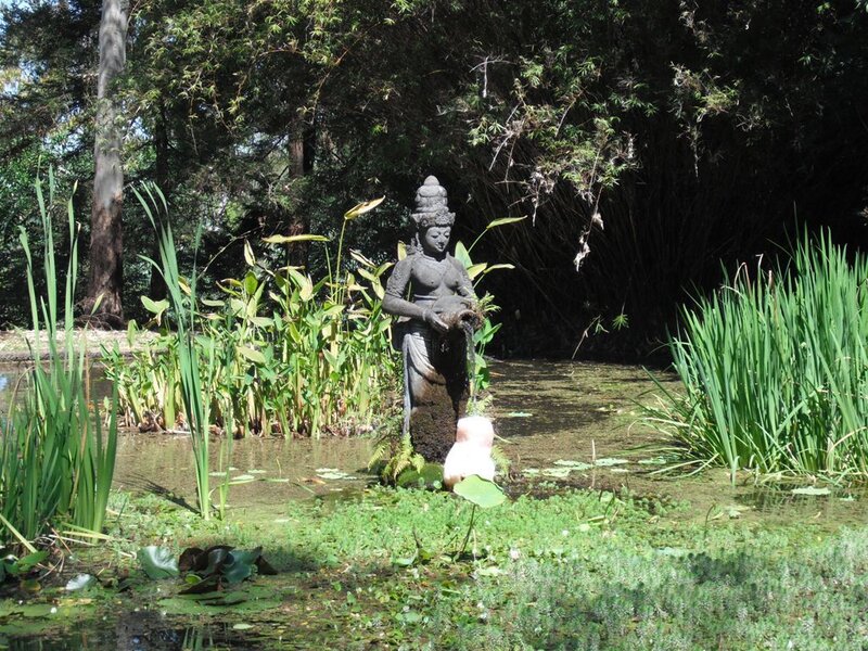 Stone Statue in Pond — Green