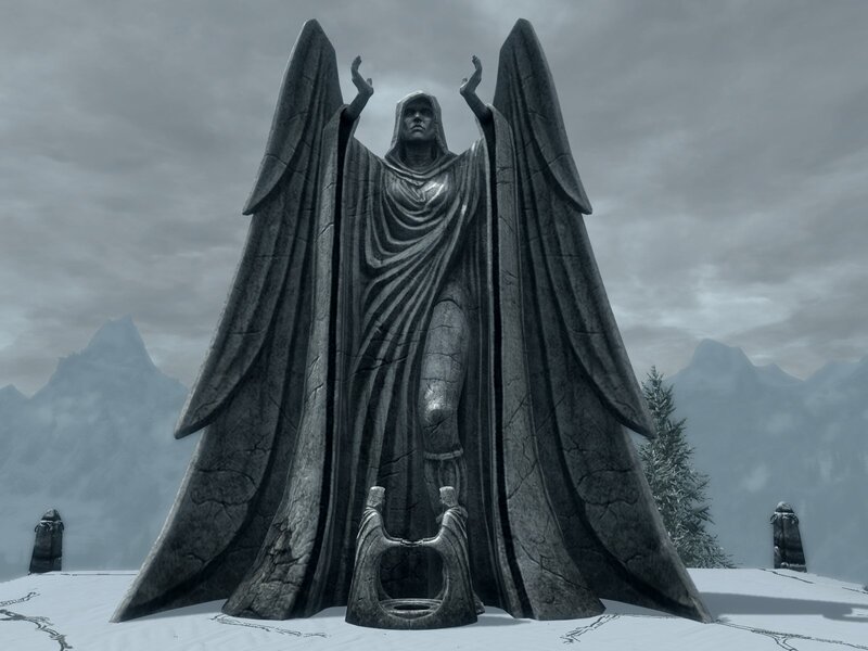 Stone Statue in Snow