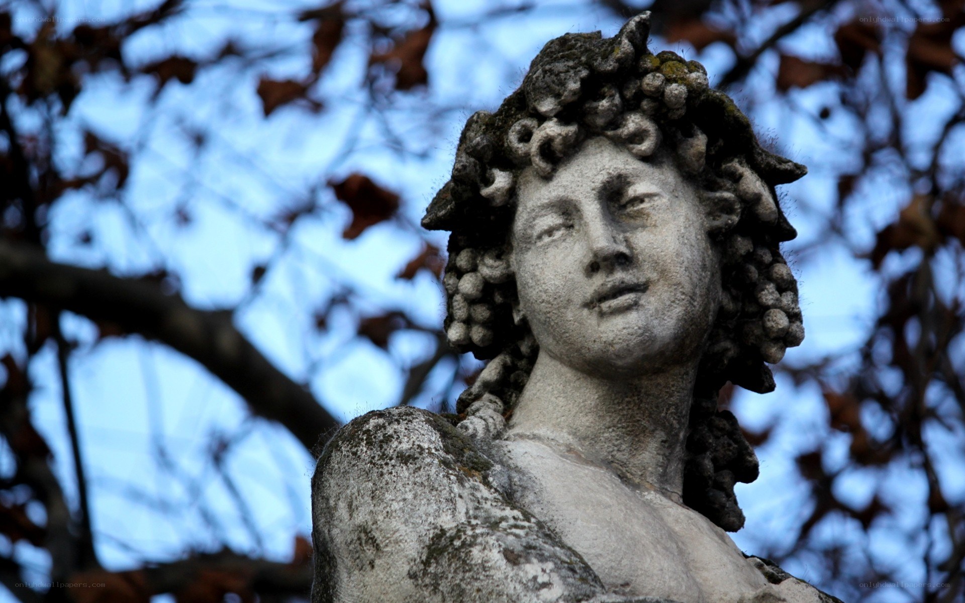 stone statue of a figure