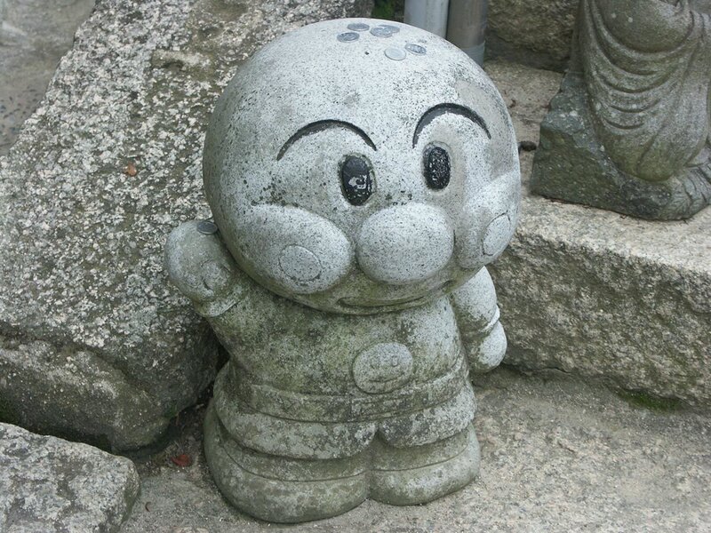 stone statue of cartoon character