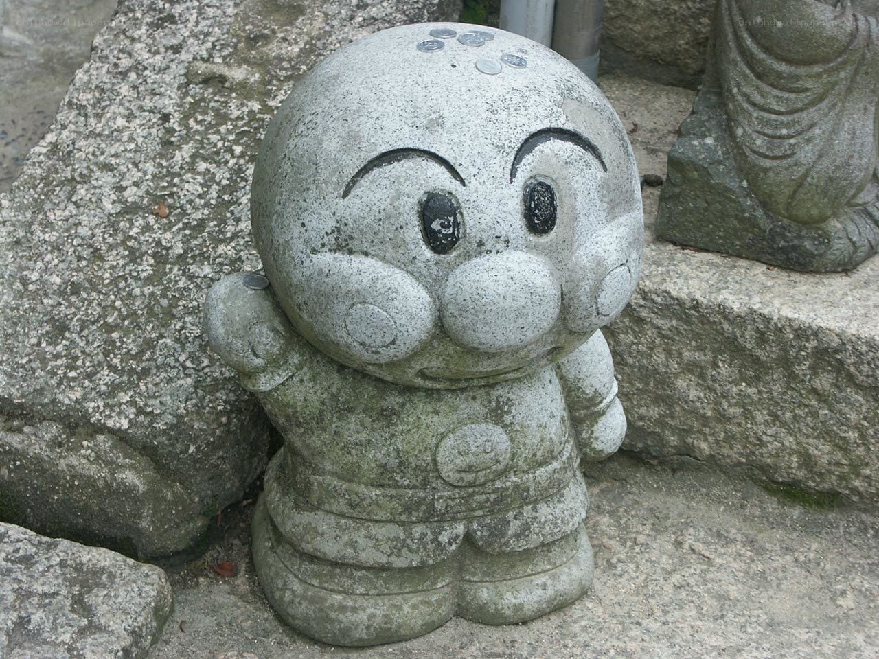 stone statue of cartoon character