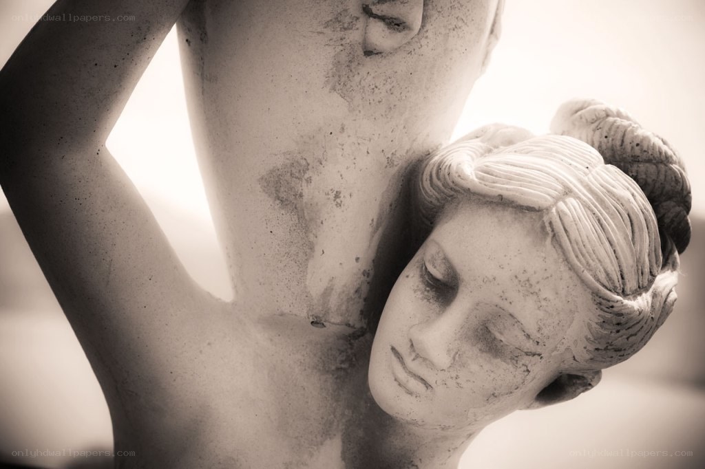 stone statue of embracing figures