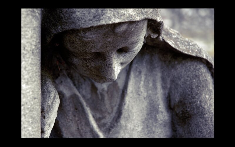 Stone Statue of Mourning Figure — Gray