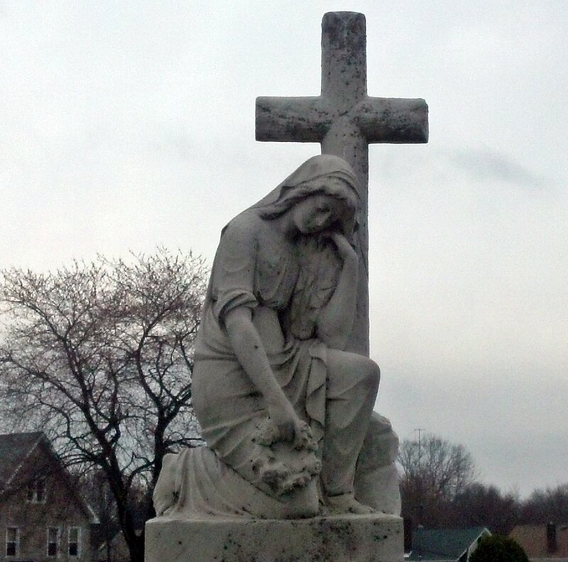 Stone Statue of Mourning Woman