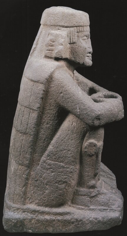 stone statue of seated figure