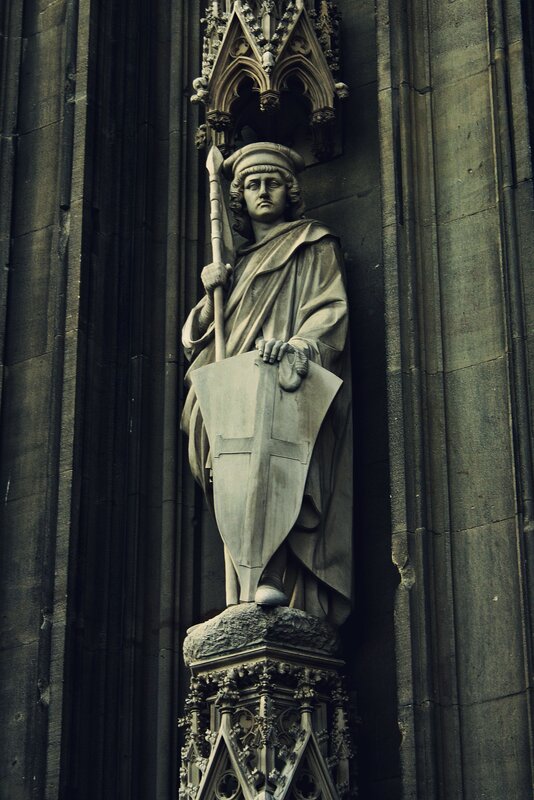 Stone statue on cathedral facade