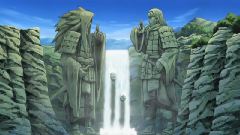 Stone Statues by Waterfall