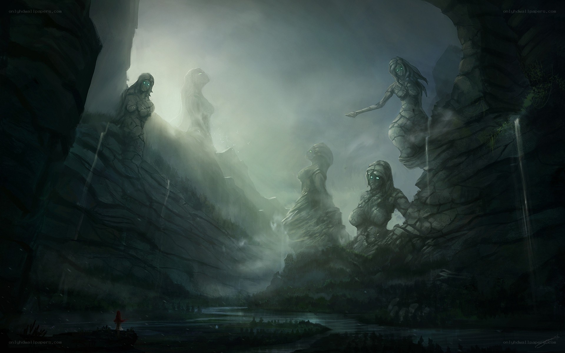 stone statues in a misty valley