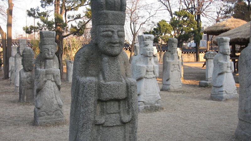 Stone statues in a park