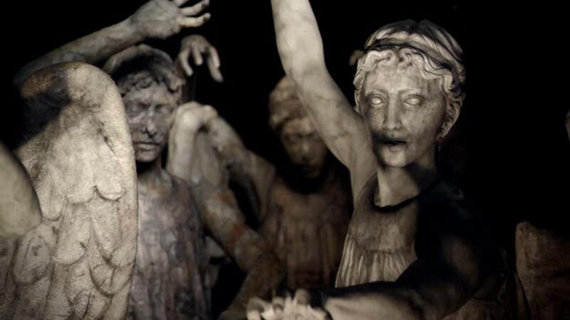 Stone Statues in Dark Room