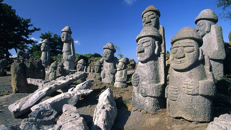 Stone statues on a hillside