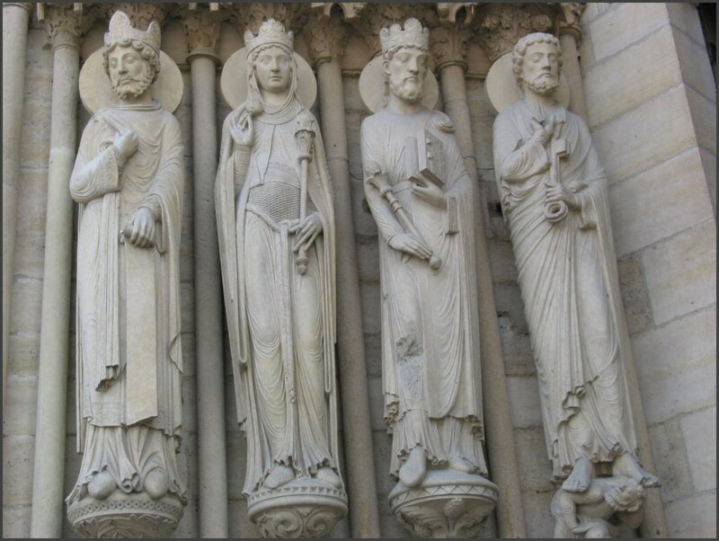 Stone Statues on Building — White