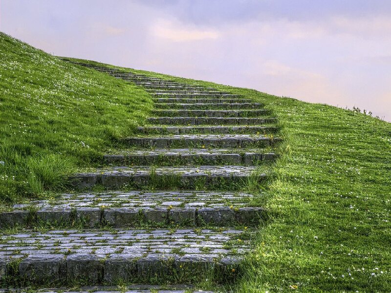 Stone steps on a grassy hill