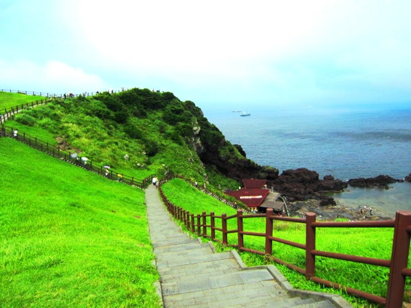 Stone Steps on Grassy Cliff