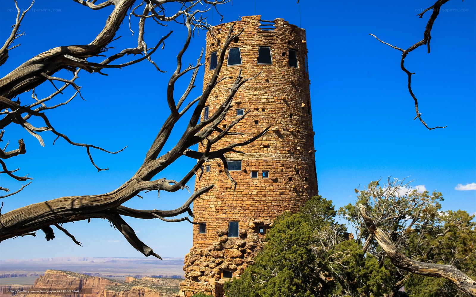 Stone tower in desert landscape