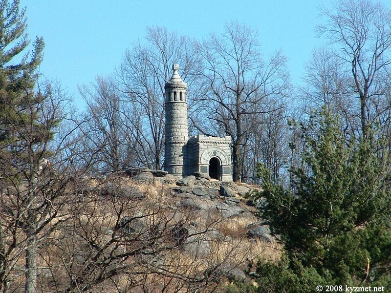 Stone tower on a rocky hill