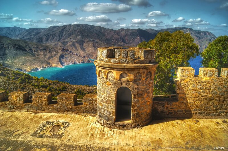 Stone Tower on Cliff — Blue, Dramatic, Afternoon, Photograph
