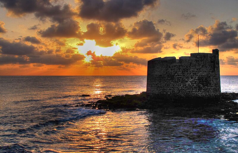 Stone Tower on Coast — Orange, Dramatic