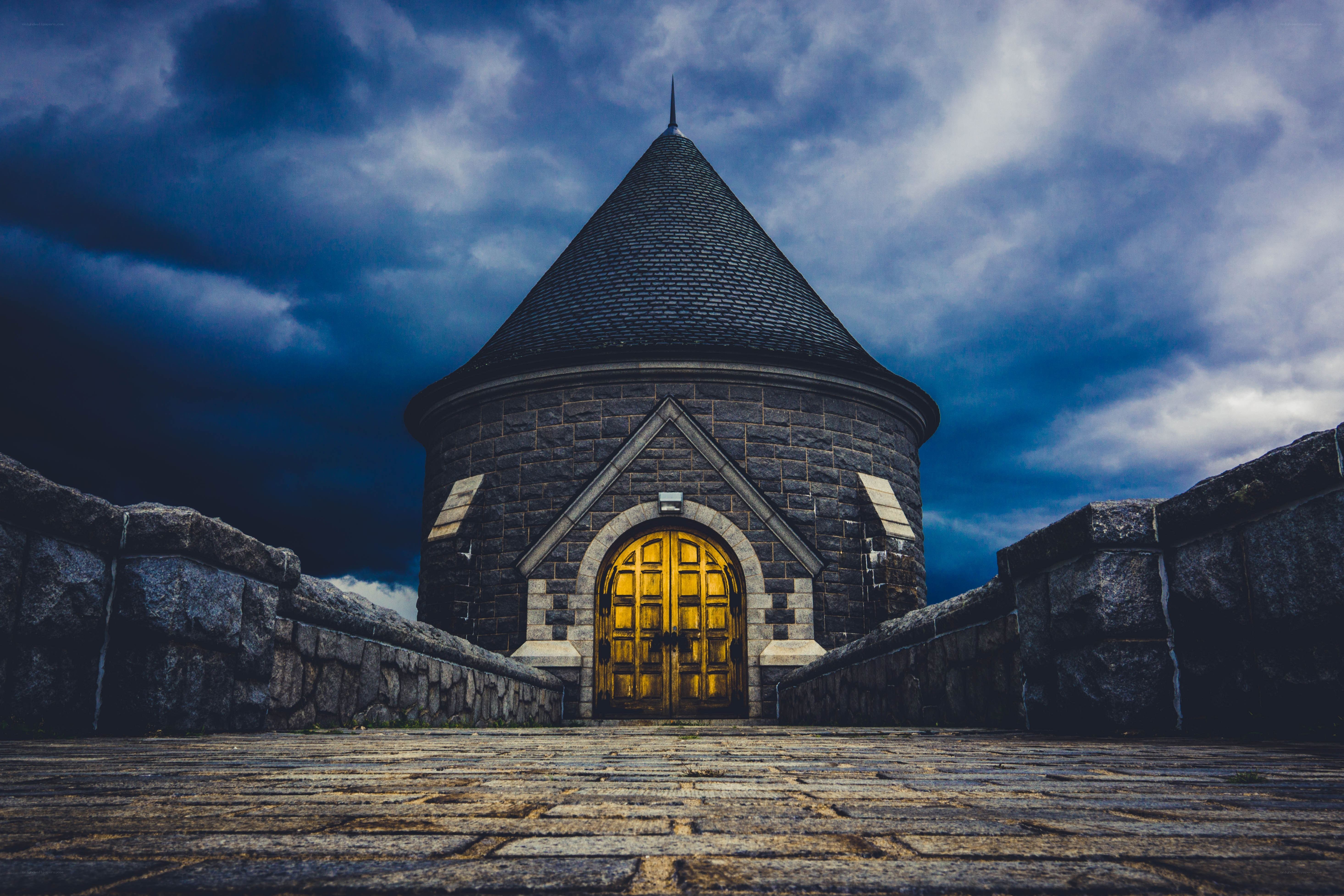 Stone tower with golden door