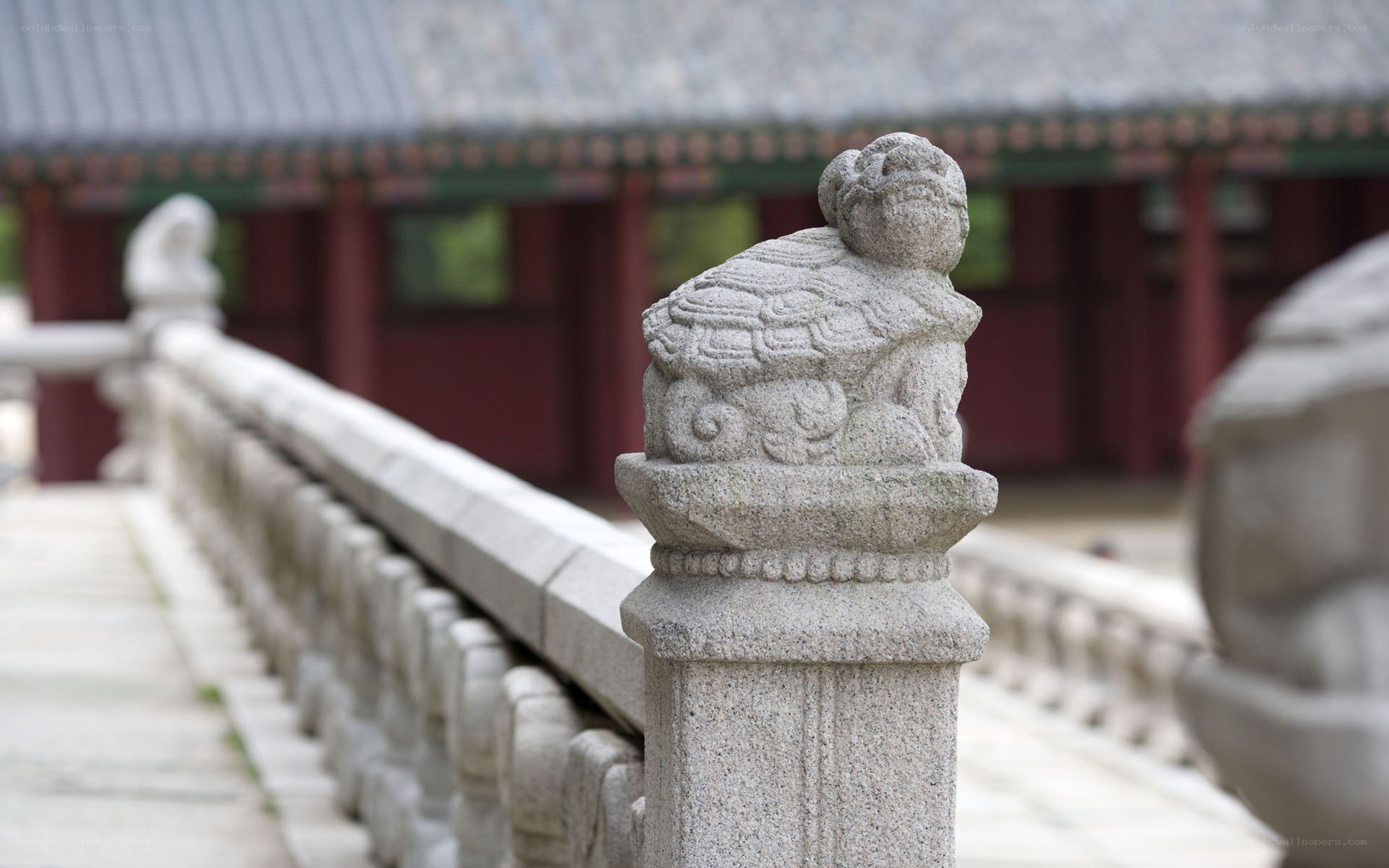 Stone turtle sculpture on a bridge