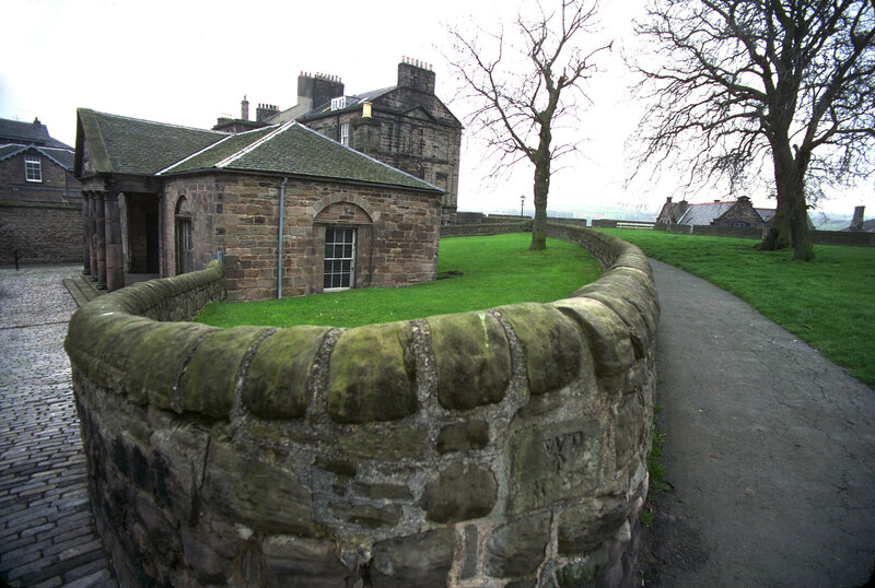 Stone wall and historic buildings