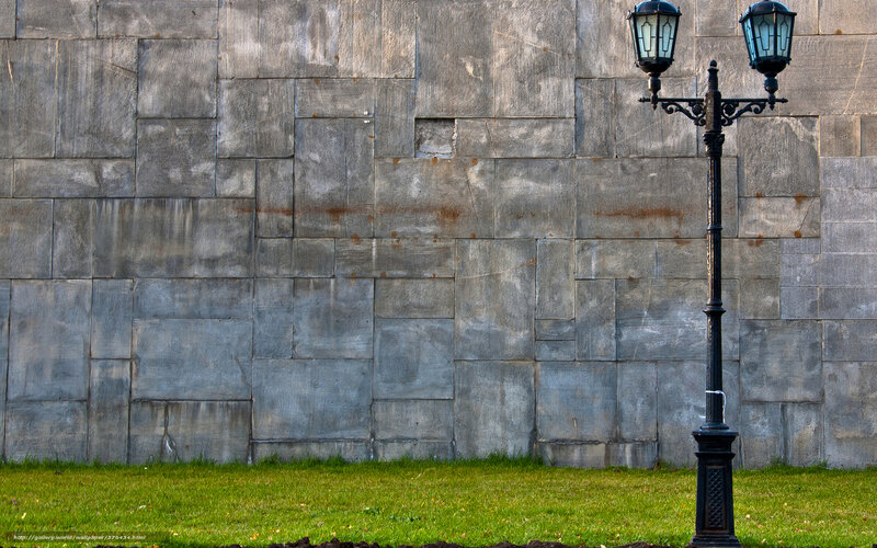 stone wall and lamp post
