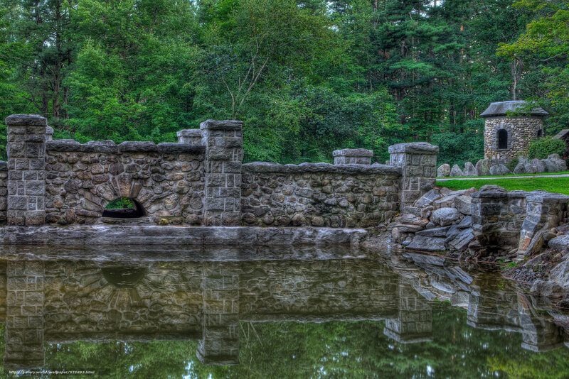 Stone wall by a pond