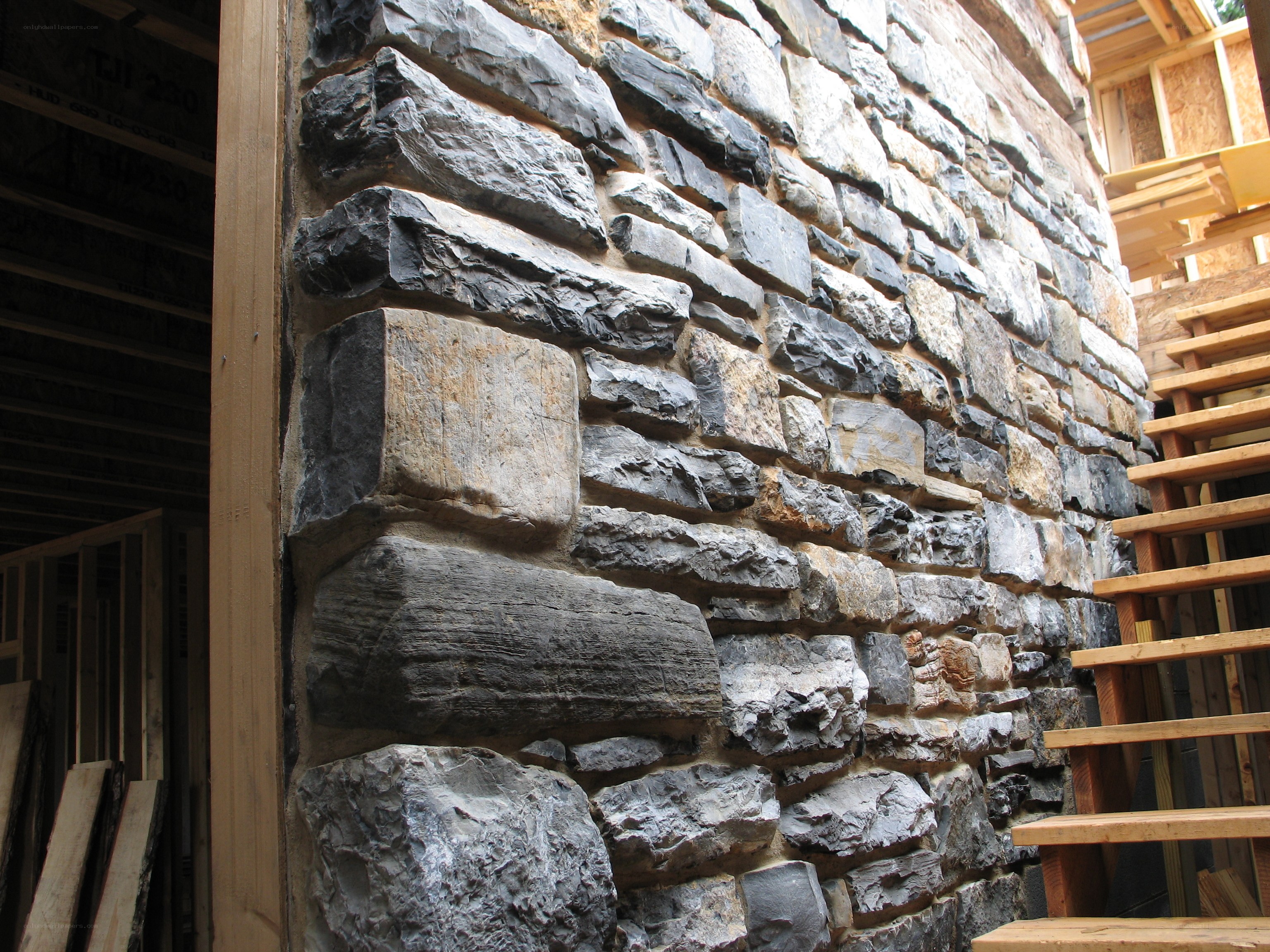 stone wall under construction
