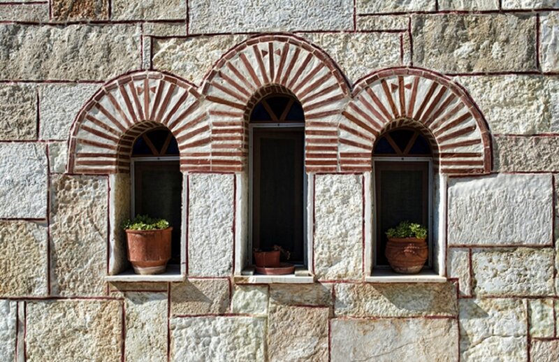 Stone Wall with Arched Windows