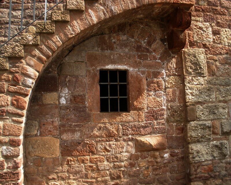 Stone Wall with Barred Window