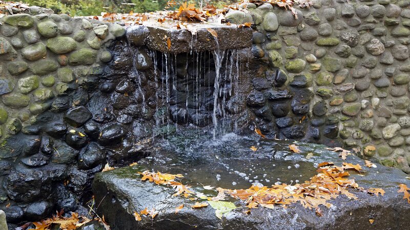 Stone Waterfall with Leaves
