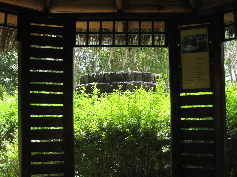 Stone Well in Garden