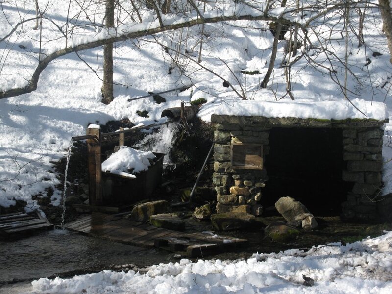 Stone Well in Snow