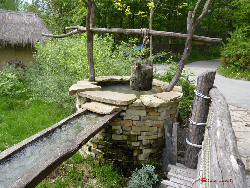 Stone Well with Wooden Bucket