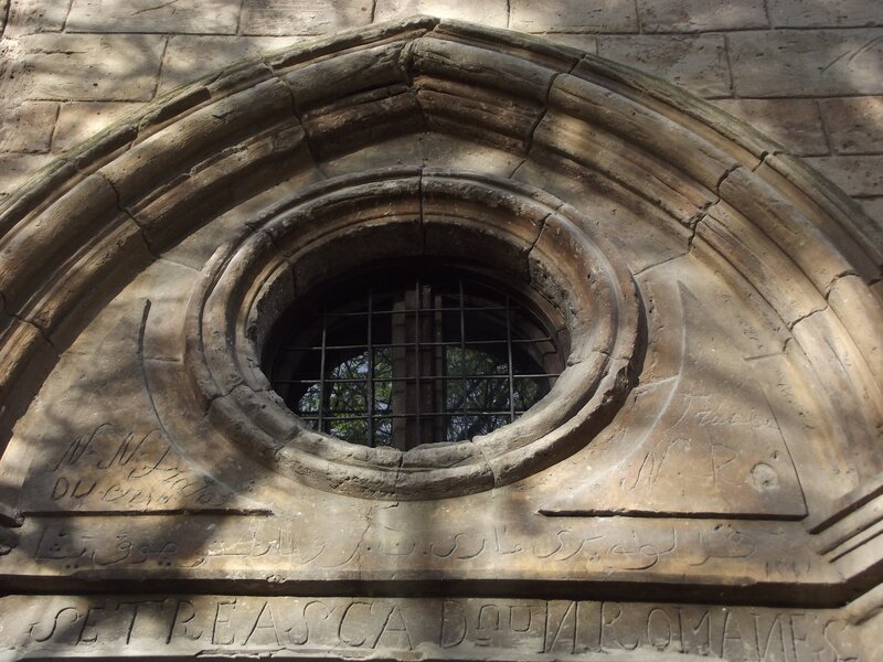 Stone Window with Inscription