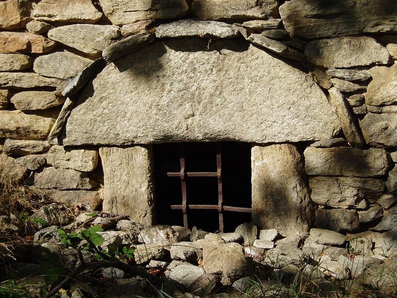 Stone window with iron bars